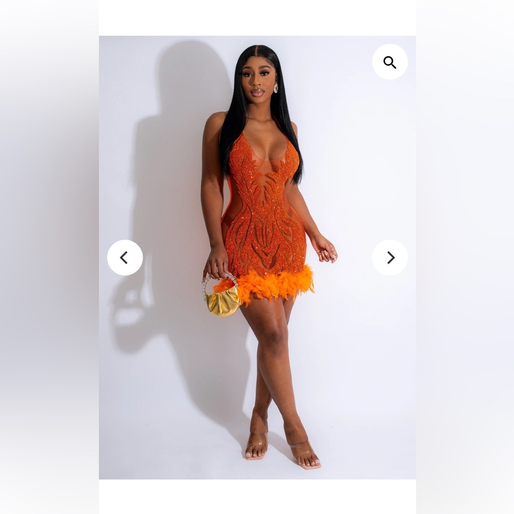 Beautiful orange sequin and mesh dress.